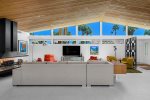 Living Room Features 65 Inch TV, Iconic Floating Fireplace, Clerestory Windows